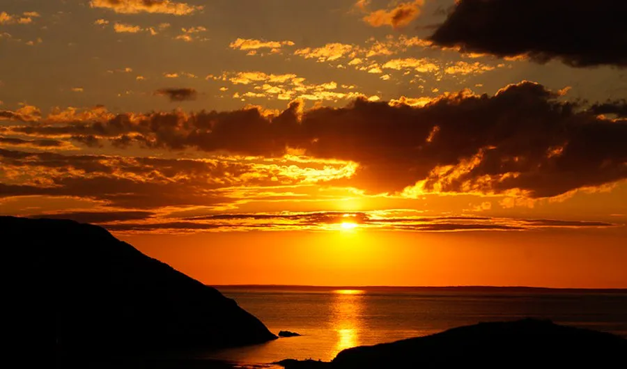 O pôr do sol na ilha da Nova Inglaterra